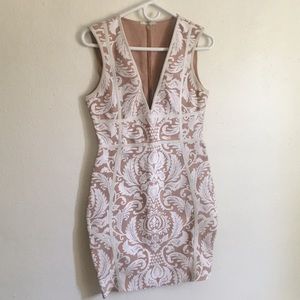 White and tan bodycon dress.